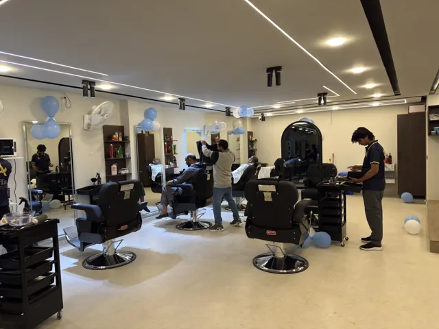 Barbers at work across the hall on opening weekend